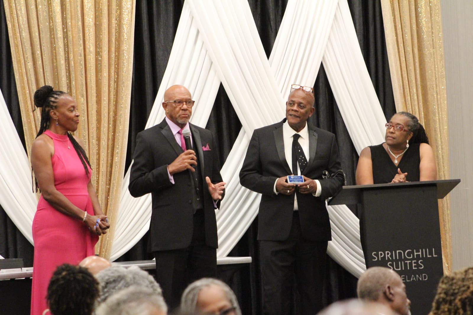 MBE Community Impact Awards Gala on stage at SpringHill Suites